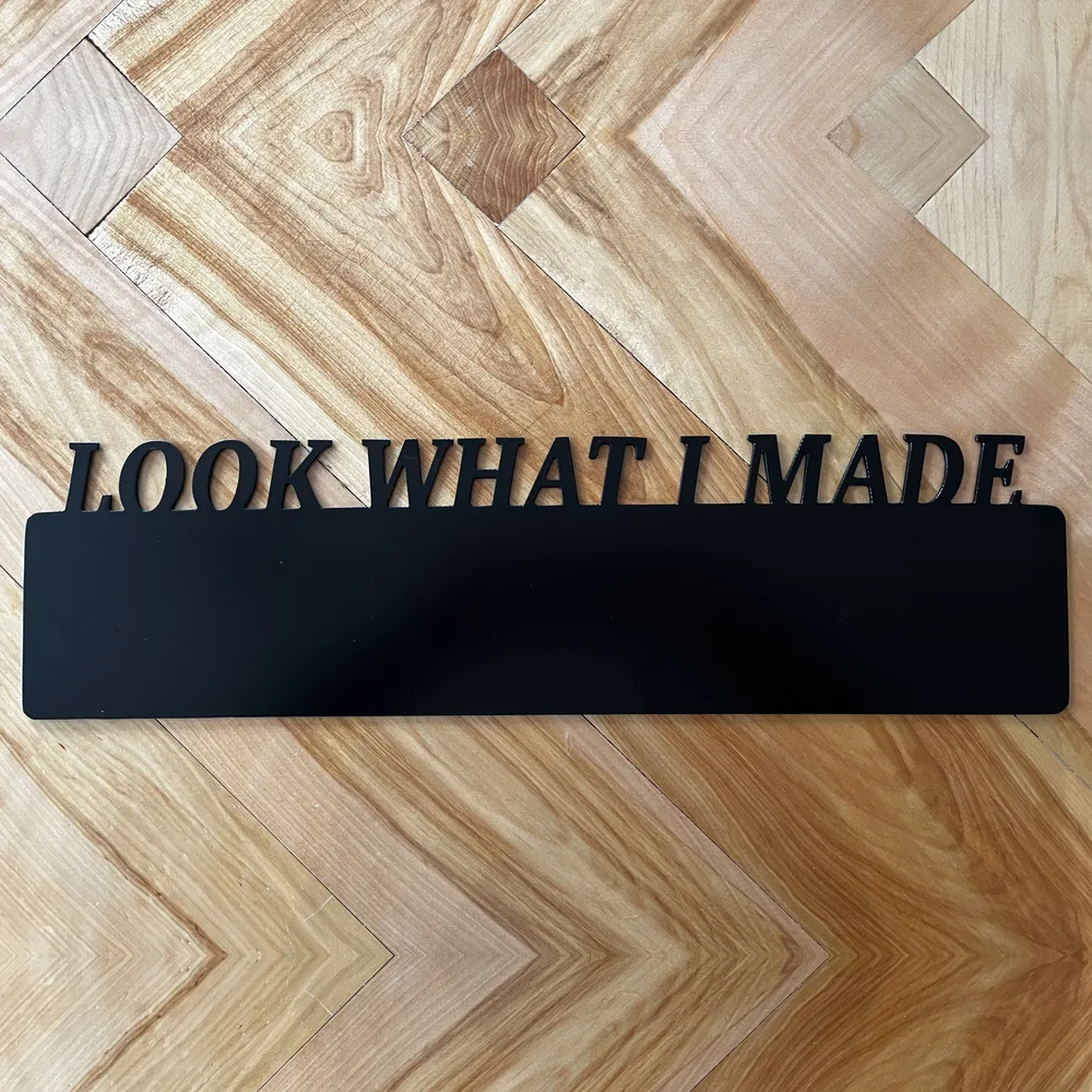 Black steel Look What I Made magnet board.